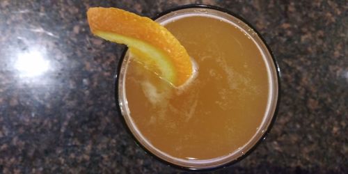 High angle view of lemon in glass on table