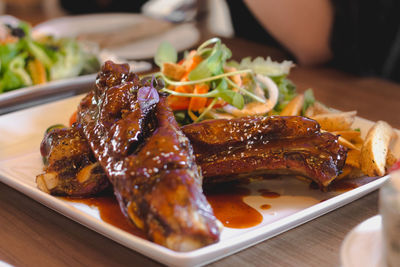 Close-up of meat on barbecue grill