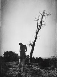 Woman walking on field