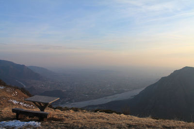 Scenic view of mountains against sky during sunset