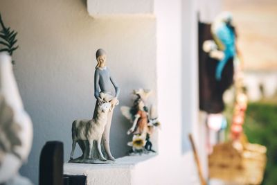 Close-up of figurines at home