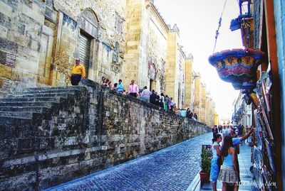 People walking in historic building