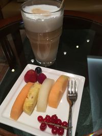 Close-up of fruits in plate on table