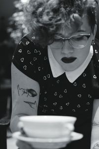 Close-up of woman wearing eyeglasses