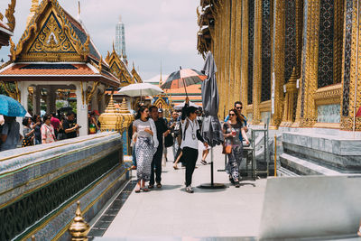 People at temple in city