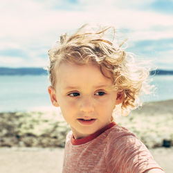 Portrait of cute boy on beach