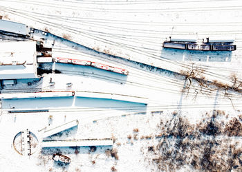 High angle view of frozen boat during winter