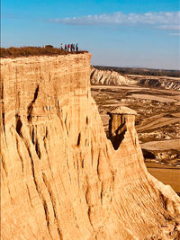 Rock formations on landscape against sky