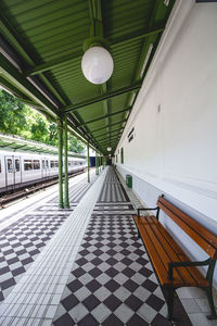 Empty benches on railroad station platform