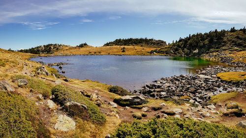 Scenic view of rocks against sky