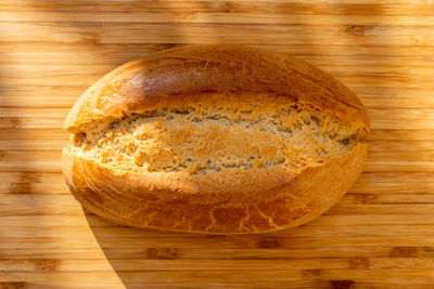 High angle view of bread on cutting board