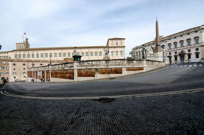 Buildings in city against sky