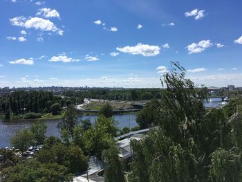 River amidst trees against sky