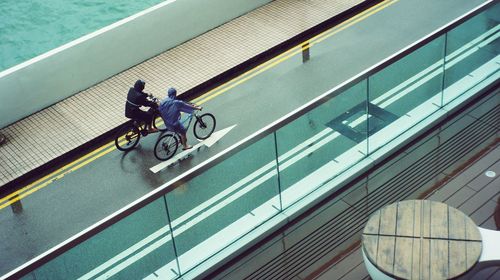 High angle view of man riding bicycle