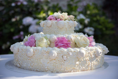 Close-up of wedding cake on table