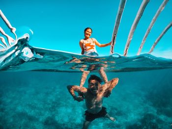 Man swimming in sea