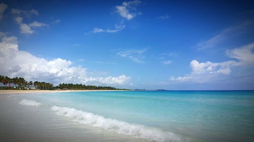 Scenic view of sea against cloudy sky