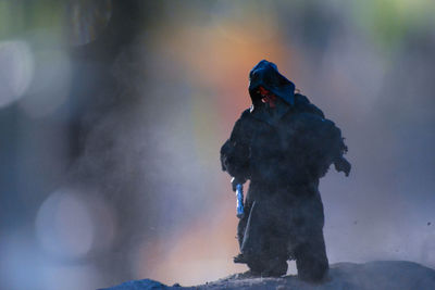 Silhouette of woman on snow