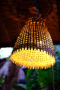 Low angle view of illuminated lanterns hanging on ceiling