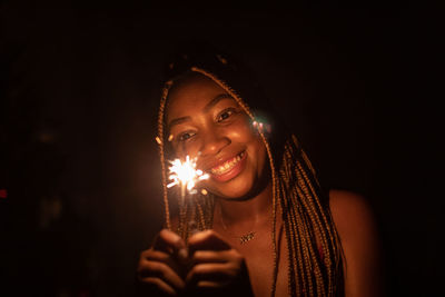 Close-up of illuminated candle