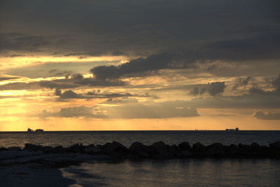 Scenic view of sea against sky during sunset