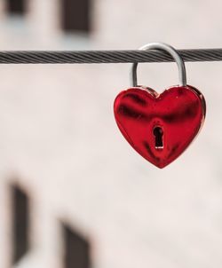 Close-up of padlocks hanging on metal