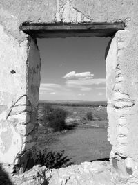 Scenic view of sea by building against sky