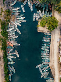 Aerial view of boats moored at harbor