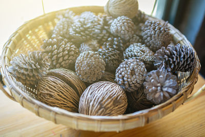 High angle view of eggs in basket on table