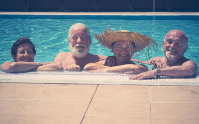 Portrait of people at swimming pool