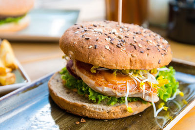 Close-up of burger in tray on table