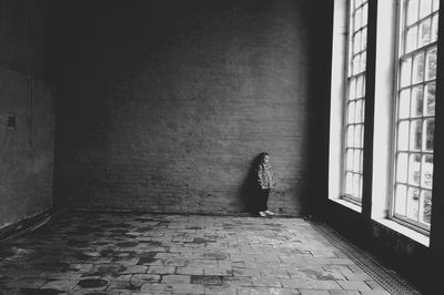 View of girl in empty room