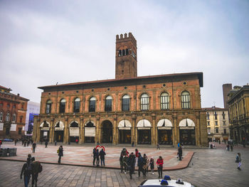 People in front of historical building