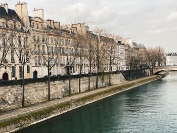 Paris cityscape and city life, seive river, riverbanks and bridge, paris center, ile saint louis 