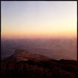 Scenic view of landscape at sunset