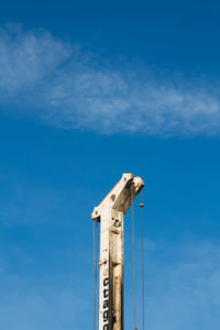 Low angle view of built structure against blue sky