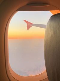 Scenic view of sea seen through airplane window