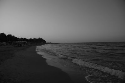 Scenic view of beach against clear sky