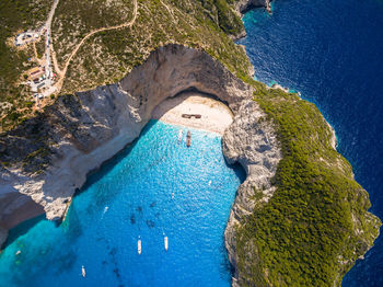 Aerial view of sea and road on mountain