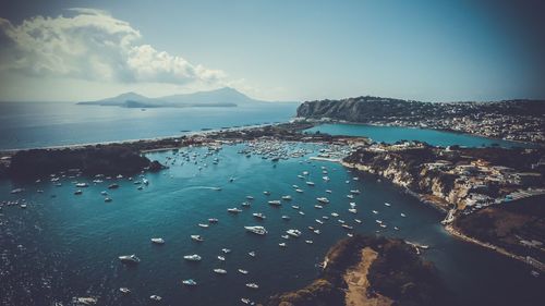 High angle view of sea shore against sky