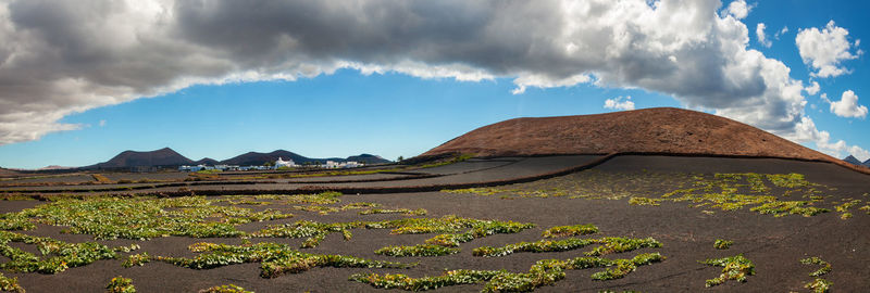 Panoramic view of volcanic mountain against sky