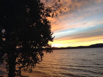 Scenic view of sea at sunset