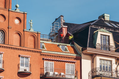 Low angle view of buildings against clear sky