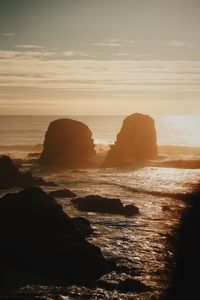 Scenic view of sea against sky during sunset