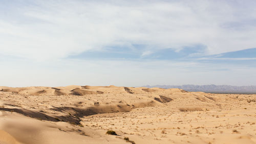 Scenic view of desert against sky