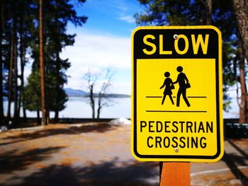 Close-up of warning sign on road