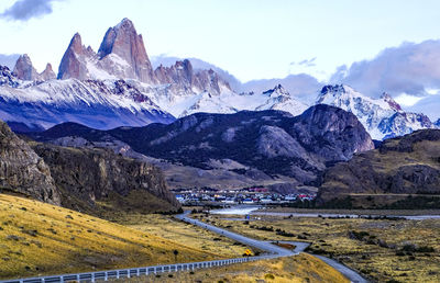 Scenic view of snowcapped mountains against sky