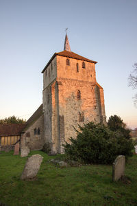 Low angle view of old building against clear sky