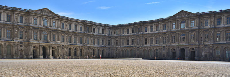 Cour carree in louvre museum during summer