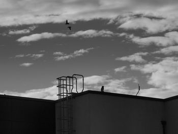 Low angle view of airplane flying in sky